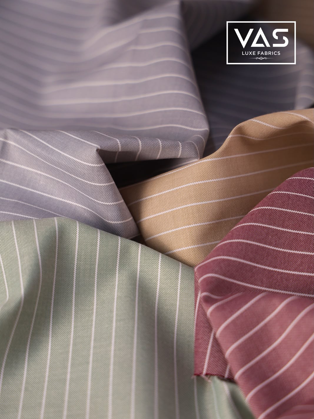 VAS Luxe Fabrics linen shirting in blue, tan, green and maroon pinstripes
