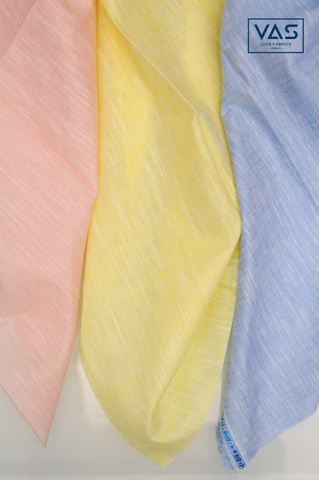 Lyocell cotton fabric in pink, yellow and blue, draped